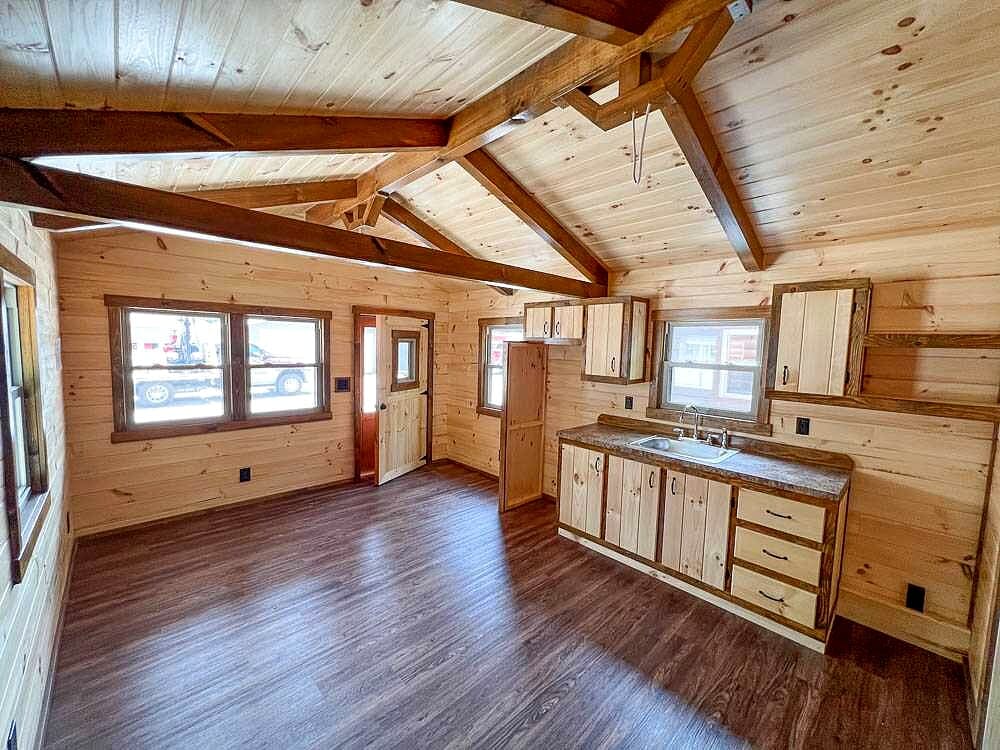 Small 12x30 Hunter Cabin with a Warm Rustic Interior