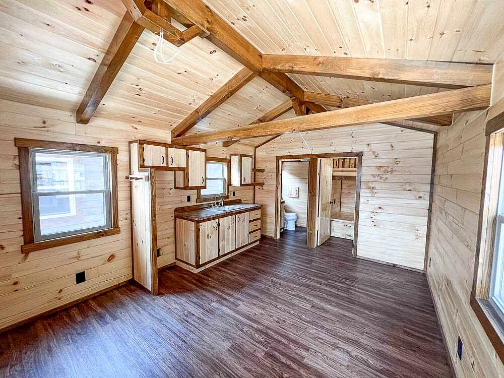 Small 12x30 Hunter Cabin with a Warm Rustic Interior