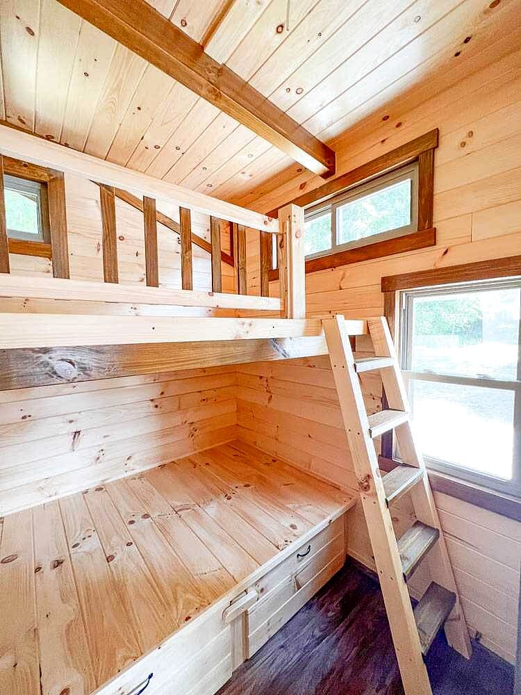 Small 12x30 Hunter Cabin with a Warm Rustic Interior