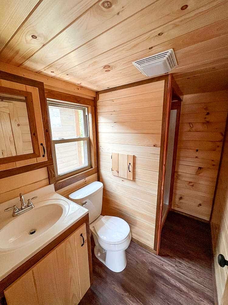 Small 12x30 Hunter Cabin with a Warm Rustic Interior
