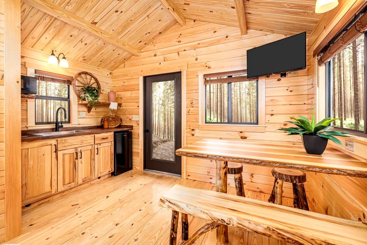 A Beautiful 195 Sq Ft Backyard Cabin Kit with a Comfortable Front Porch