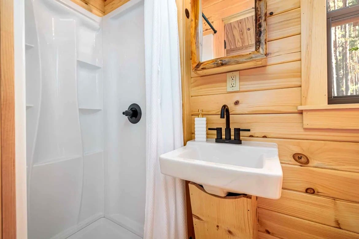 A Beautiful 195 Sq Ft Backyard Cabin Kit with a Comfortable Front Porch