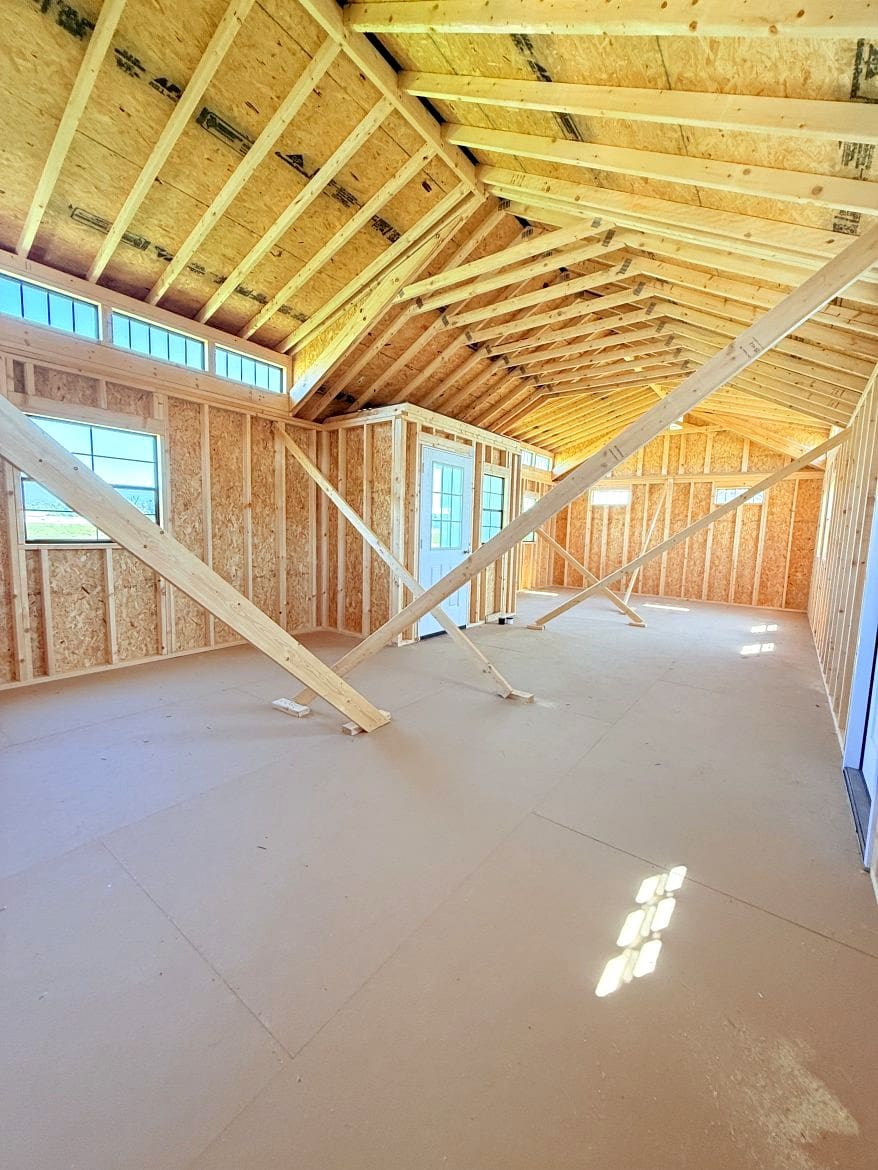 Exploring the 16x36 Center Cabin: Recessed Porch and Open Concept Layout