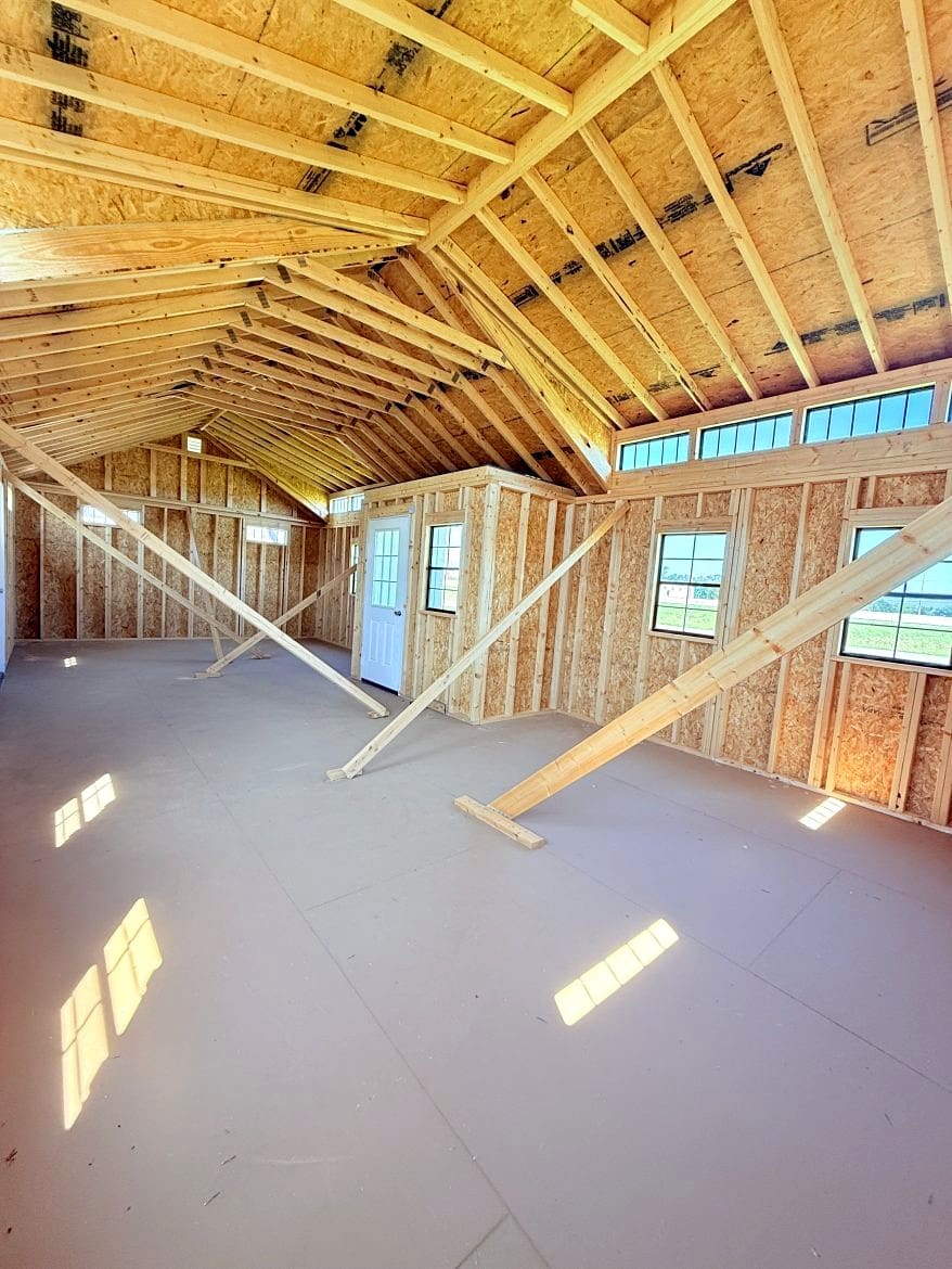 Exploring the 16x36 Center Cabin: Recessed Porch and Open Concept Layout