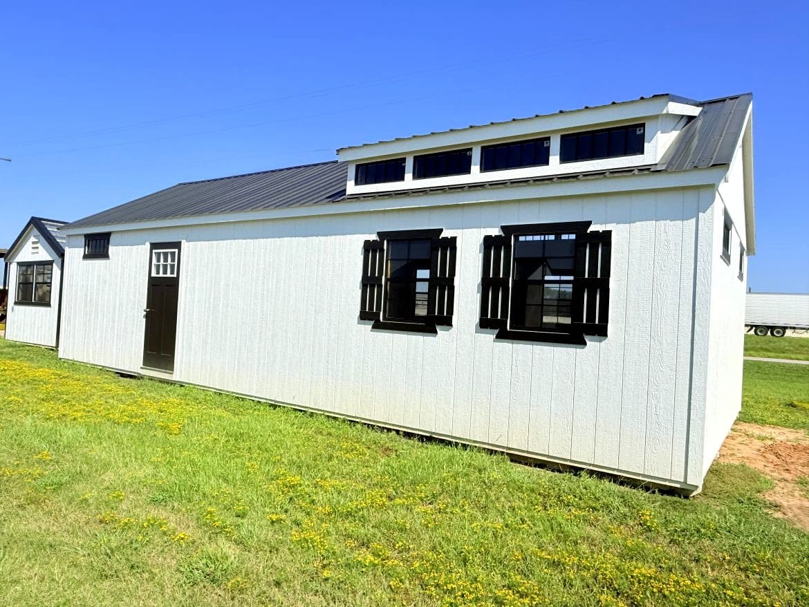Exploring the 16x36 Center Cabin: Recessed Porch and Open Concept Layout