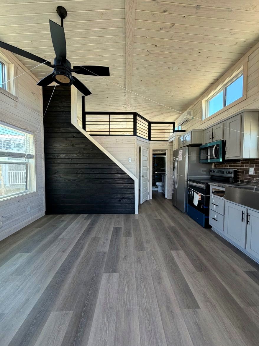 Touring a Highly Functional 15x42 Tiny Home with a Stunning Interior Layout