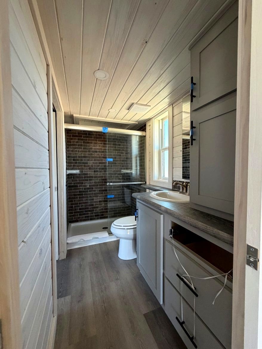 Touring a Highly Functional 15x42 Tiny Home with a Stunning Interior Layout