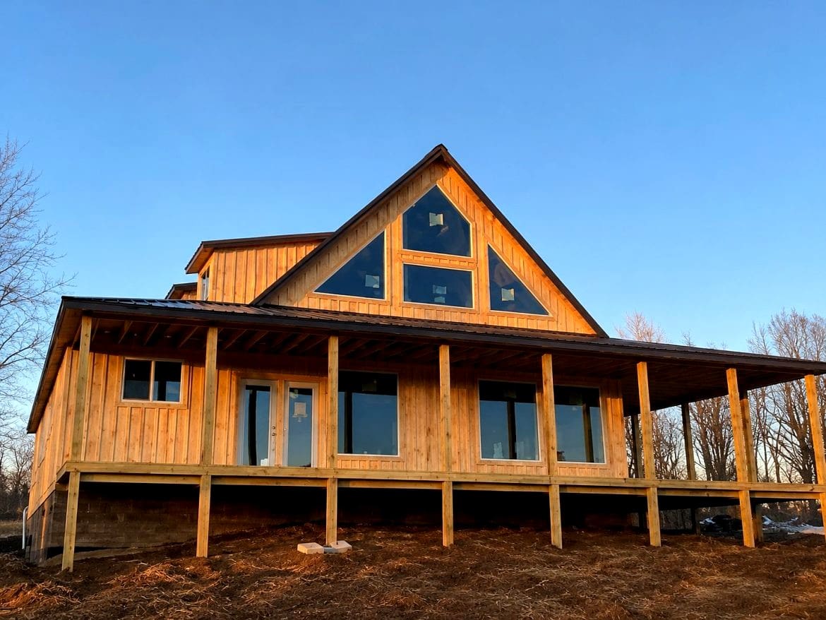 Exploring an Amish-Built Two-Story Gable Cabin Kit with Wraparound Porch