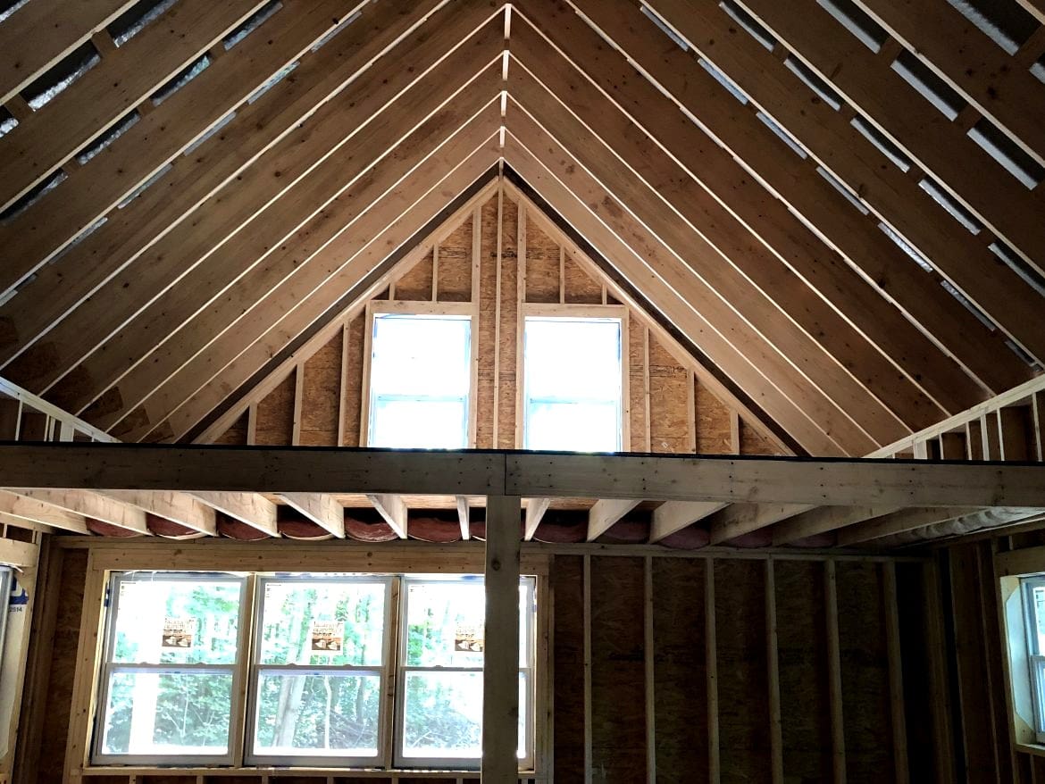 The Autumn Lodge: A Charming $65K Cabin with a Wraparound Porch