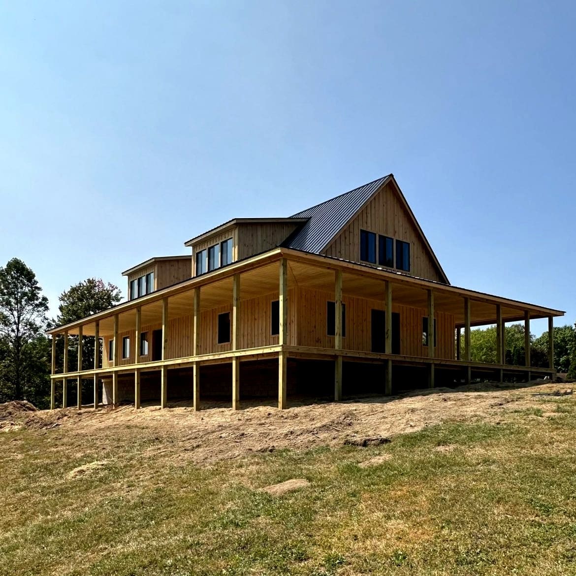 Tour a Dream 30x60 Two-Story Gable Cabin with Wraparound Porches