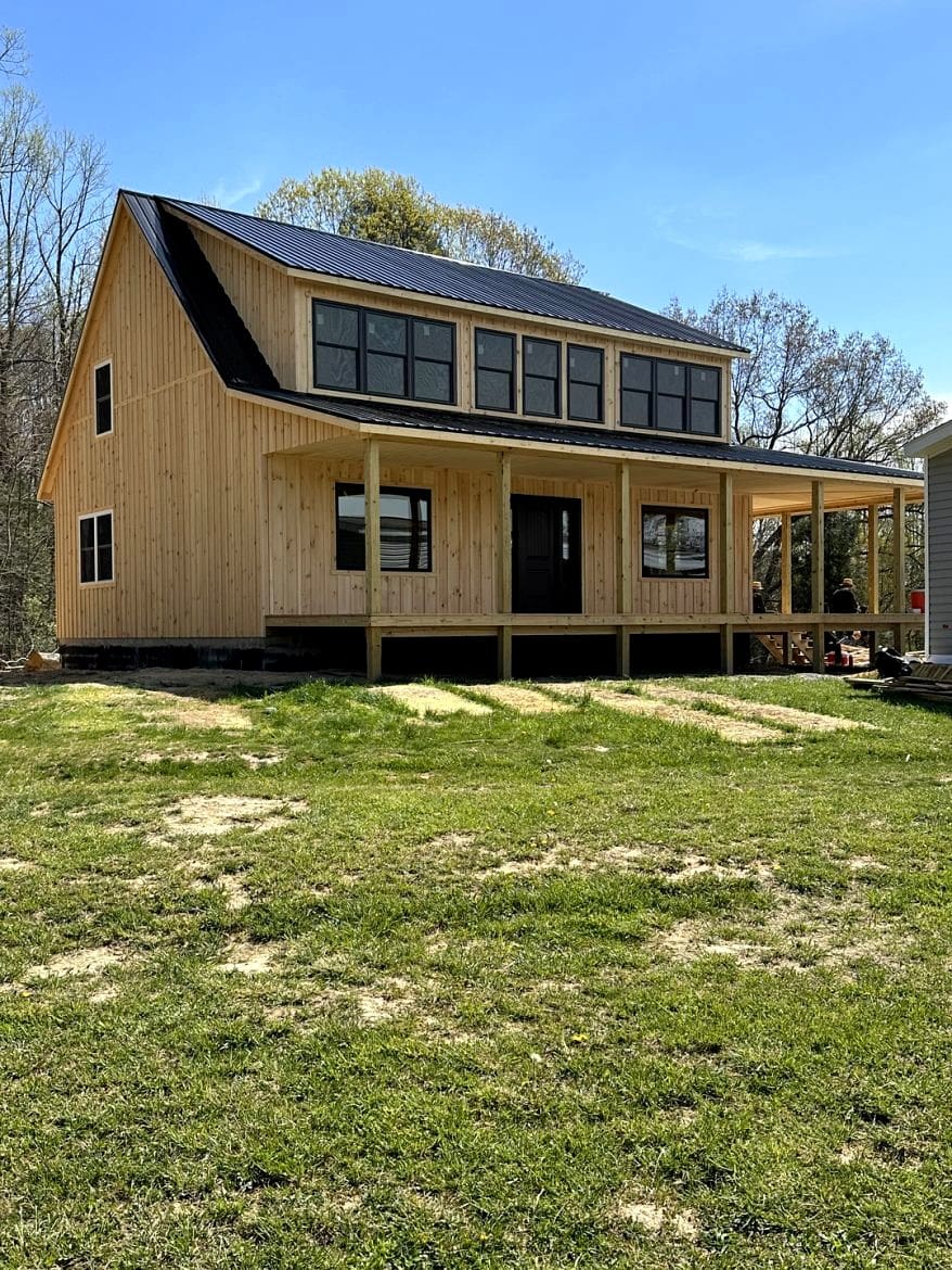 Exploring a Double-Porch Amish Gable Cabin: Two Stories of Timeless Craftsmanship for $69,995