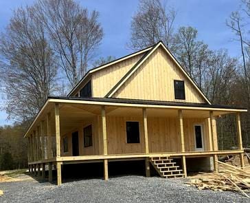 Exploring a Double-Porch Amish Gable Cabin: Two Stories of Timeless Craftsmanship for $69,995
