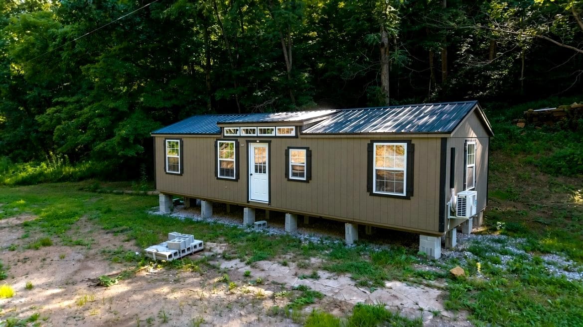 A Closer Look Inside This Secluded Rustic Cabin on 3 Wooded Acres for $59,900