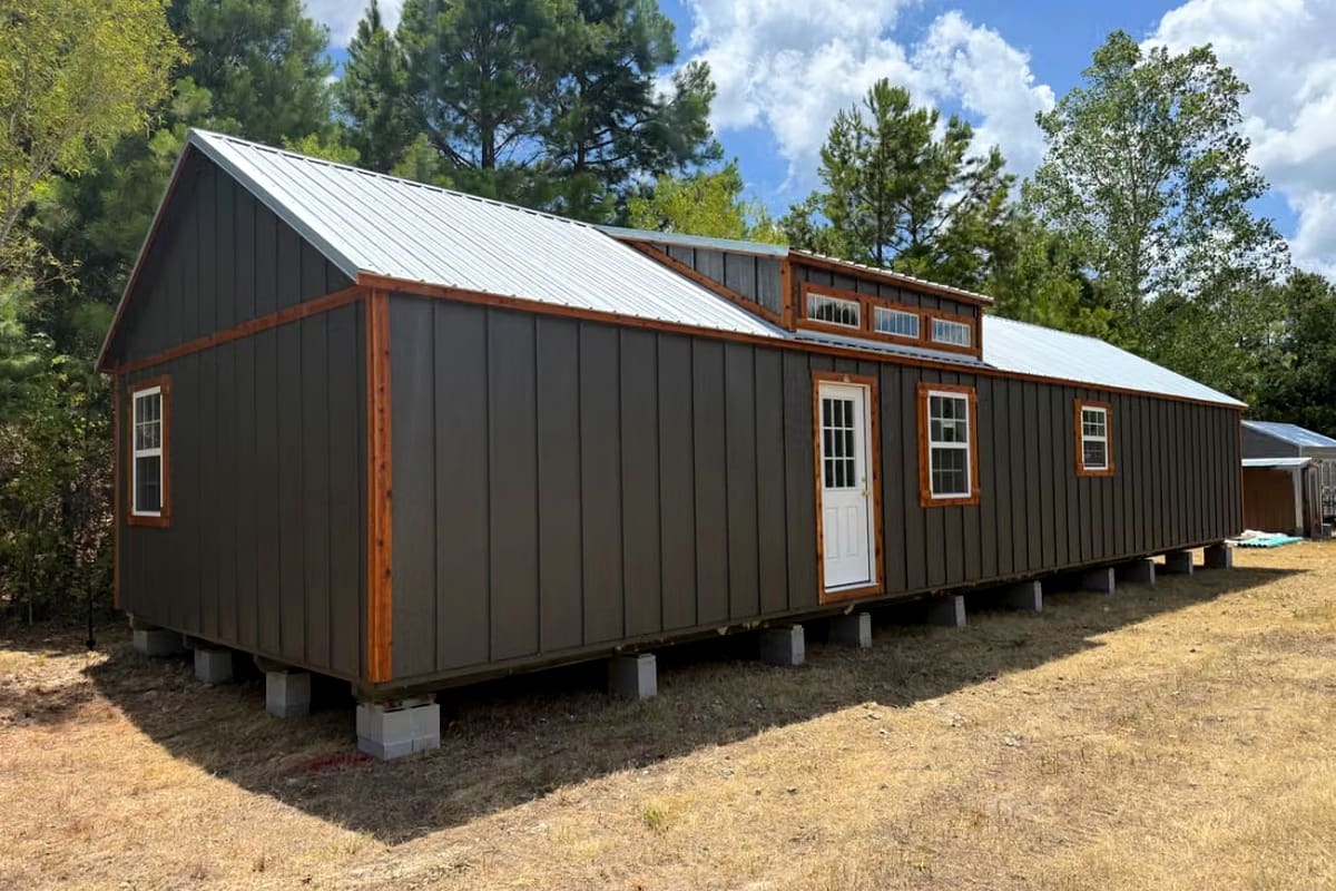 Touring an 18×60 Custom Cabin Shell: 1,080 Sq Ft 2-Bedroom Layout for $44,000